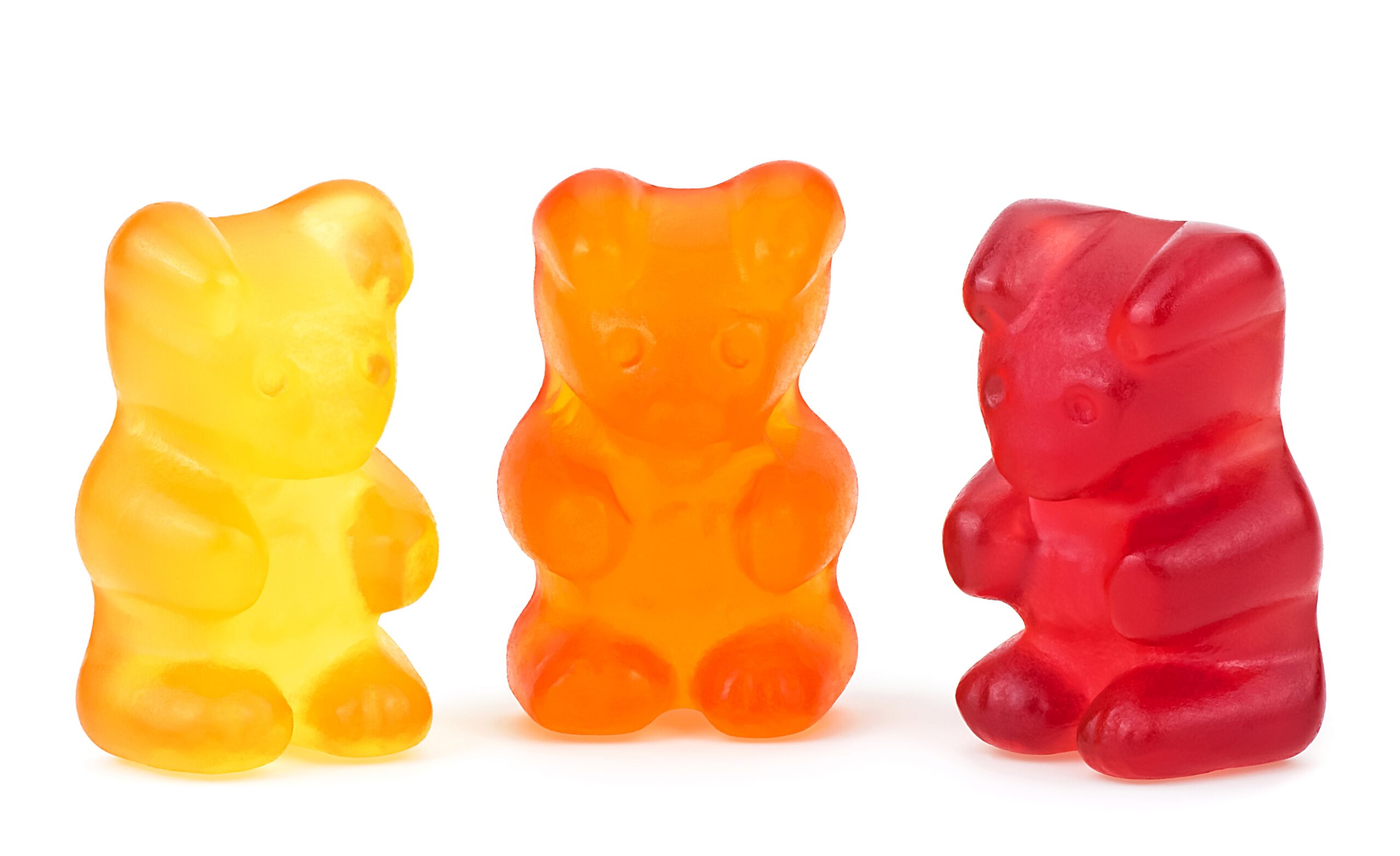 A variety of colorful gummy candies in different shapes and translucent colors, made with BioconColors natural colorants such as Anthocyanins, Carmine, and Turmeric.