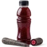 A sleek bottle of energy drink with a deep bordeaux red hue, displayed next to a fresh black carrot, showcasing BioconColors natural colorant solutions for functional beverages.